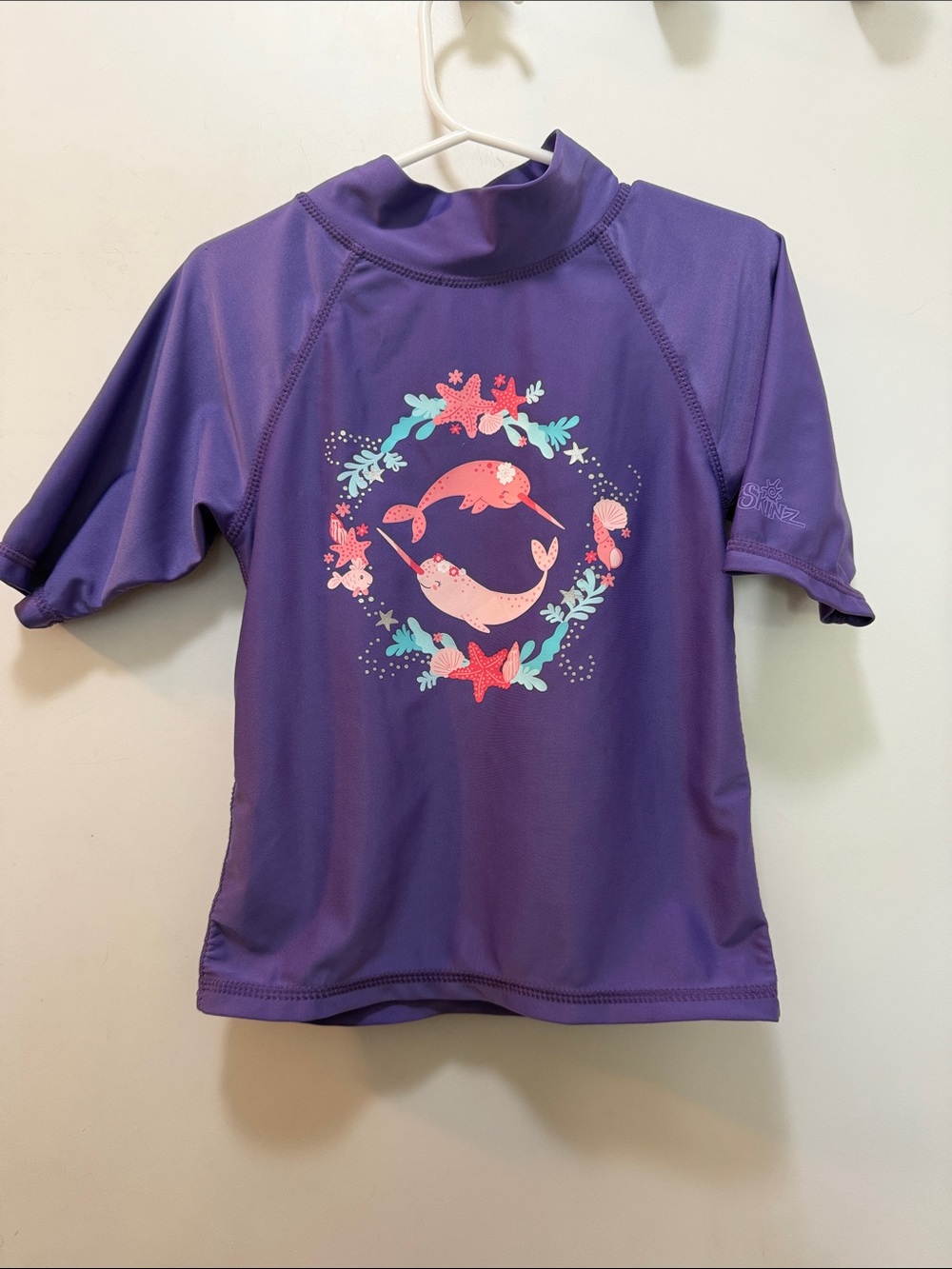 Kids Purple Short-Sleeve Rashguard Swim Top with Narwhal Print